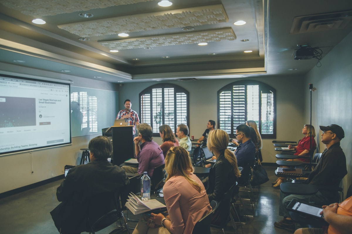 Trainer guiding a team through a workshop